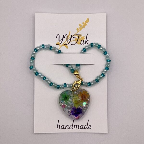 水面に浮かぶ花 / レジンストラップ / sinobu 170 YOU & YUU Fukuoka Handmade Accessories Shop